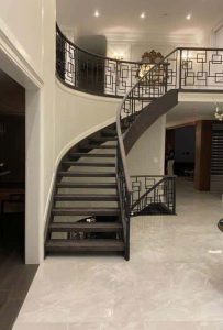 a curved staircases implemented by Darvish in Toronto