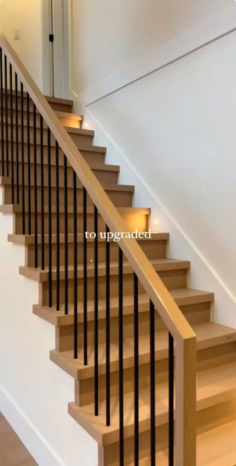 staircase with wooden railing​