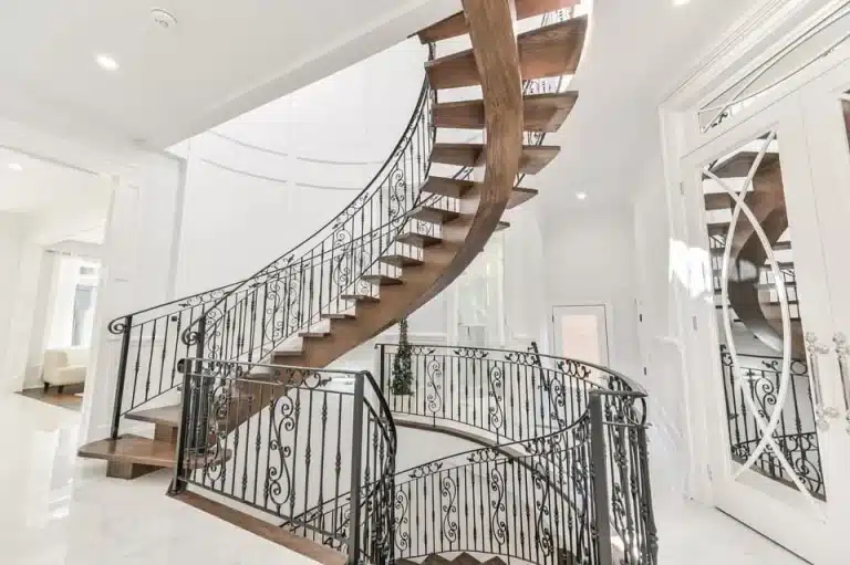 wrought iron interior railings with decorative classic design